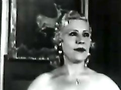 Natural blonde makes a strip show in 20s porn film