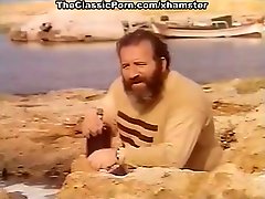 Two dudes spy on a couple fucking on the beach